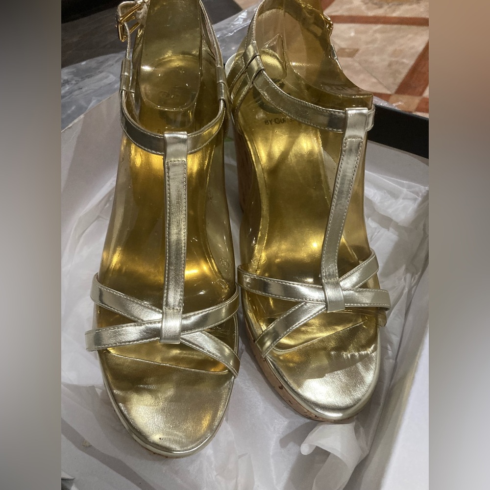 G By Guess 

GOLD WEDGE SHOES